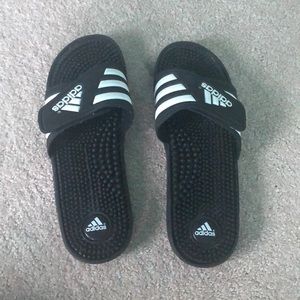 Women’s black adidas slides